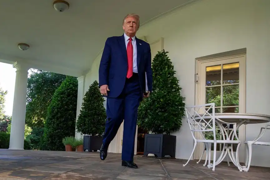 President Donald J. Trump walks to the Rose Garden as he holds a press conference at the White House in Washington, DC, USA on Tuesday, July 14, 2020.President Trump talks about Democratic presidential candidate Joe Biden, the stock market and relations w
