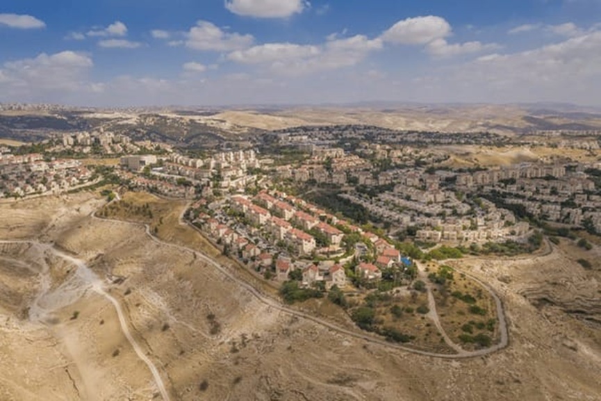 E1 SETTLEMENT