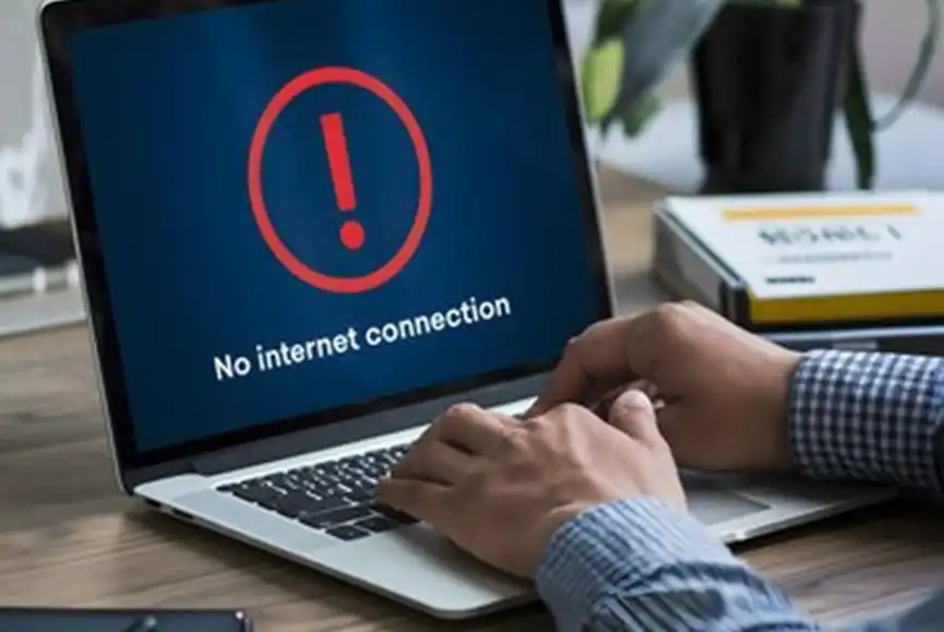 person-works-laptop-with-no-internet-connection-warning-indoor-workspace-social-media-post