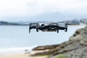modern-drone-flying-rocky-seacoast