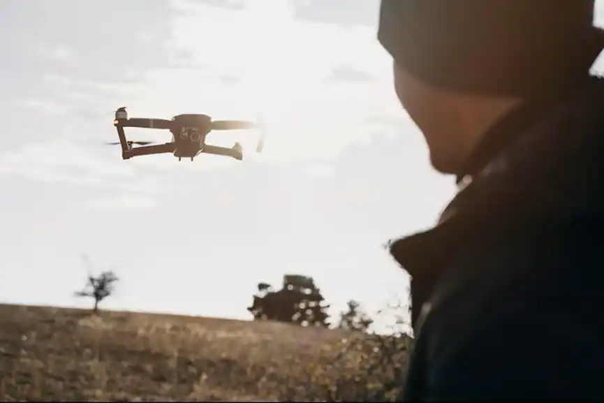 close-up-man-watching-drone