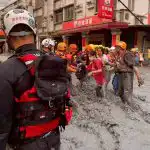 Special rescue crew members displacing people