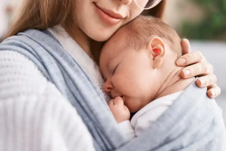 Mother-son-sleeping-baby-standing-home