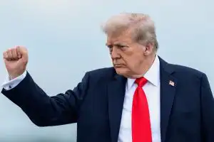 Trump signs the executive order at the White House