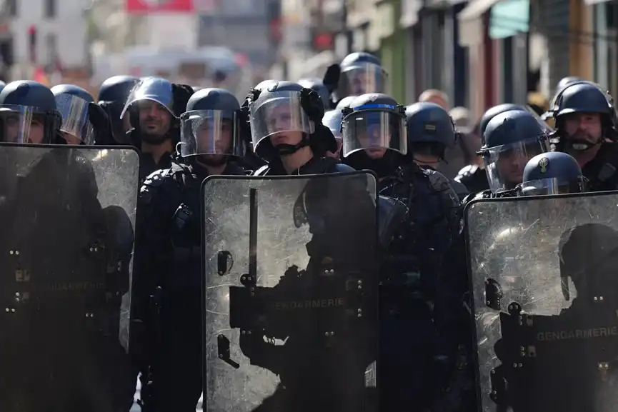 Police officers stand guard during a demonstration