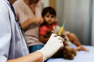 doctor-is-preparing-syringe-shot