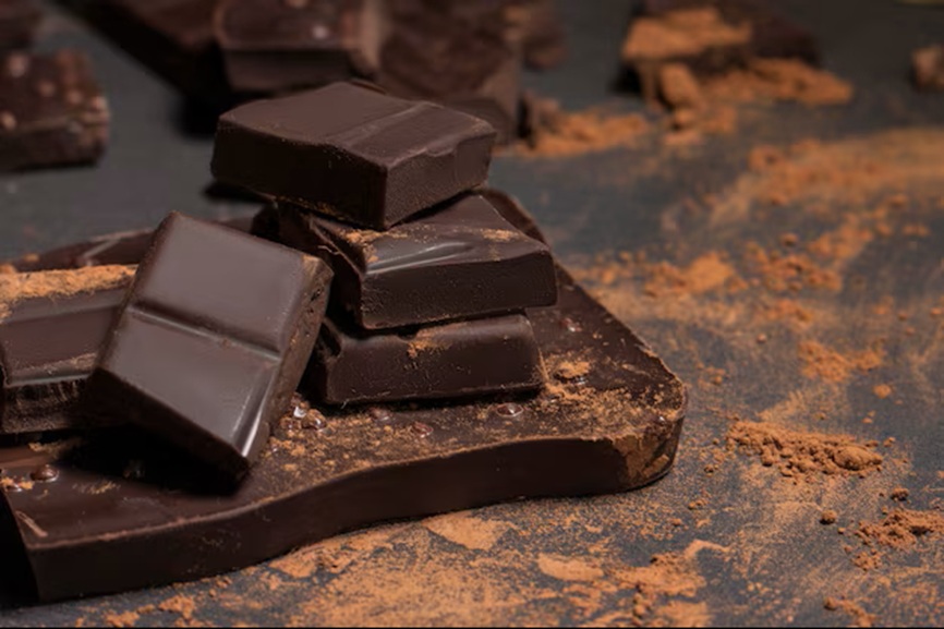 chocolate-with-cocoa-close-up-powder-grey-background