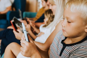 phone-addicted-family-using-their-phones-couch