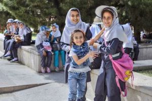 depositphotos_168021414-stock-photo-iranian-schoolgirls-in-school-uniform