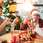 family-with-burning-bengal-fires-festive-table