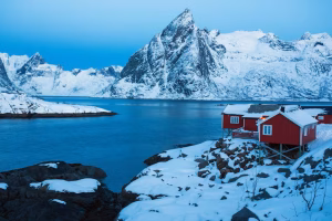 traditional-norwegian-wooden-house-rorbu-stand-shore-fjord-mountains-distance-lofoten-islands-norway-world-travel