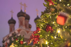 Christmas tree on the background of the Orthodox Church. Christmas. Christmas decorations. Church at Christmas